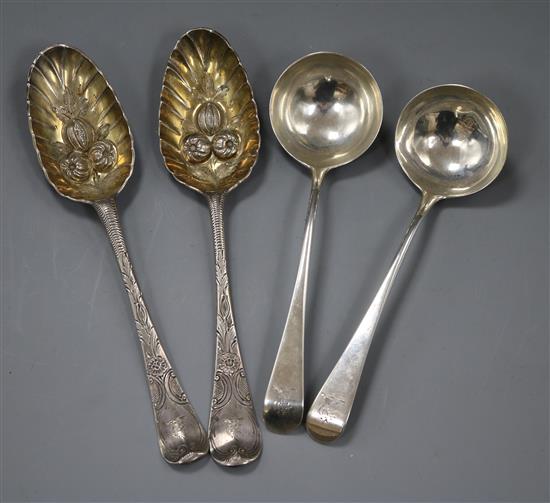 A pair of Georgian silver berry spoons and a pair of George III silver sauce ladles, 6.5 oz.